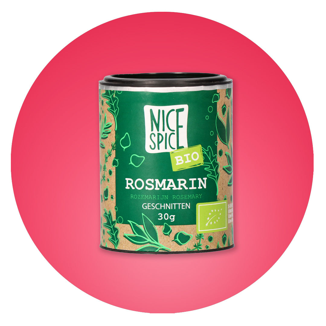 NICE SPICE Bio Rosmarin geschnitten in grüner zylinderförmiger Dose mit verspieltem Design vor pinkem Hintergrund